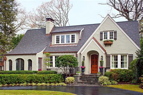 metal roof on tudor house|tudor style house exterior update.